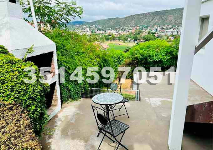 casa con asador vista a la ciudad